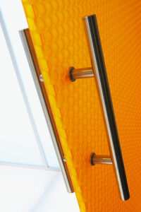 Moxie Surfaces - hinged door with handle bar clear PEP satin orange 2