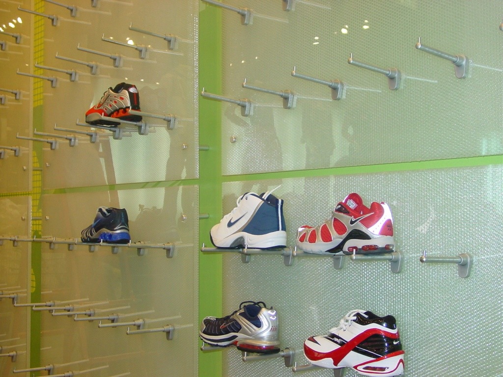 MoxieSurfaces - AIR-board clear Nike store merchendise display