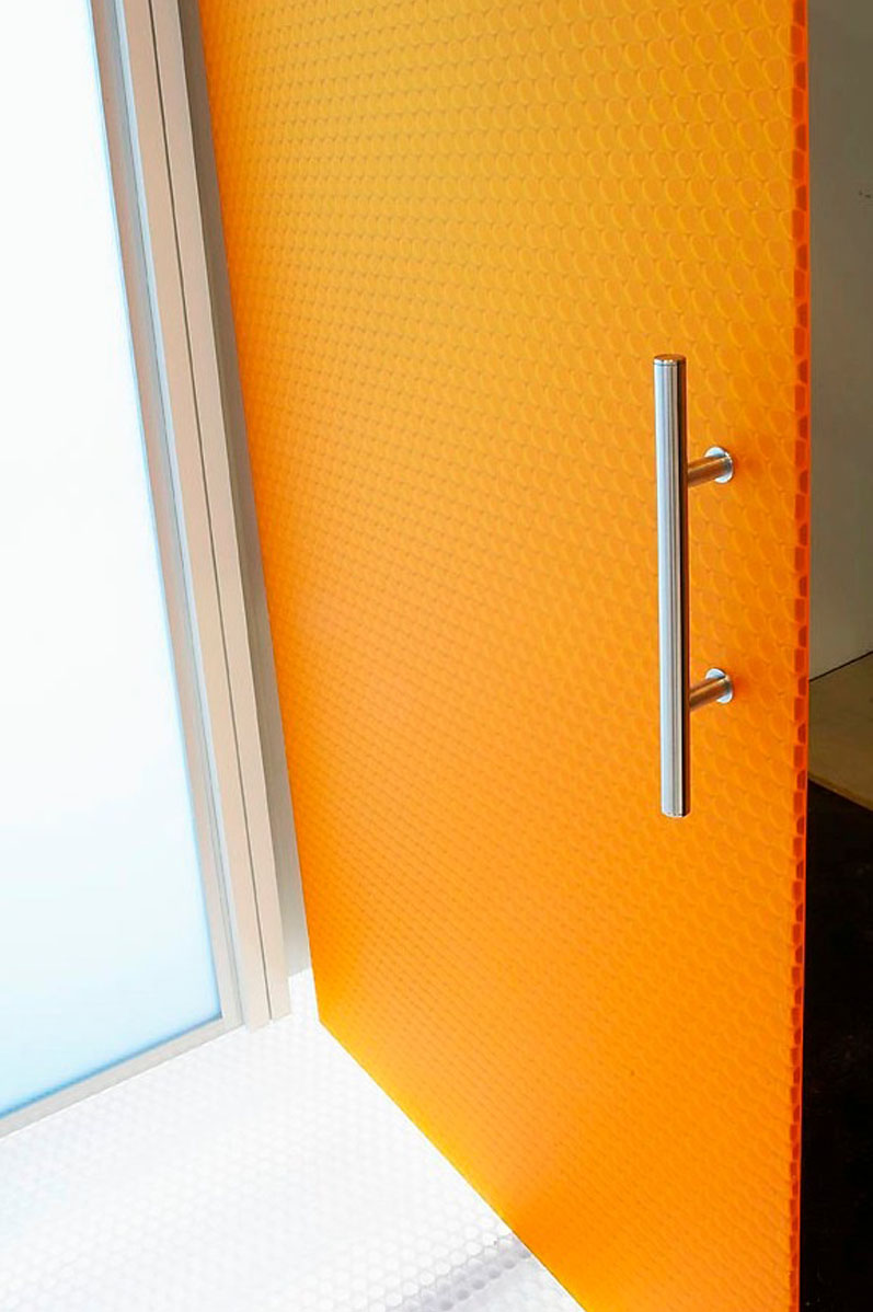 MoxieSurfaces - clear-PEP satin orange honeycomb panel door