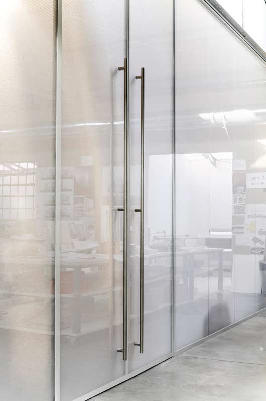 Polycarbonate door and wall panels for adaptable office spaces