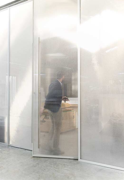Polycarbonate door and wall panels for adaptable office spaces