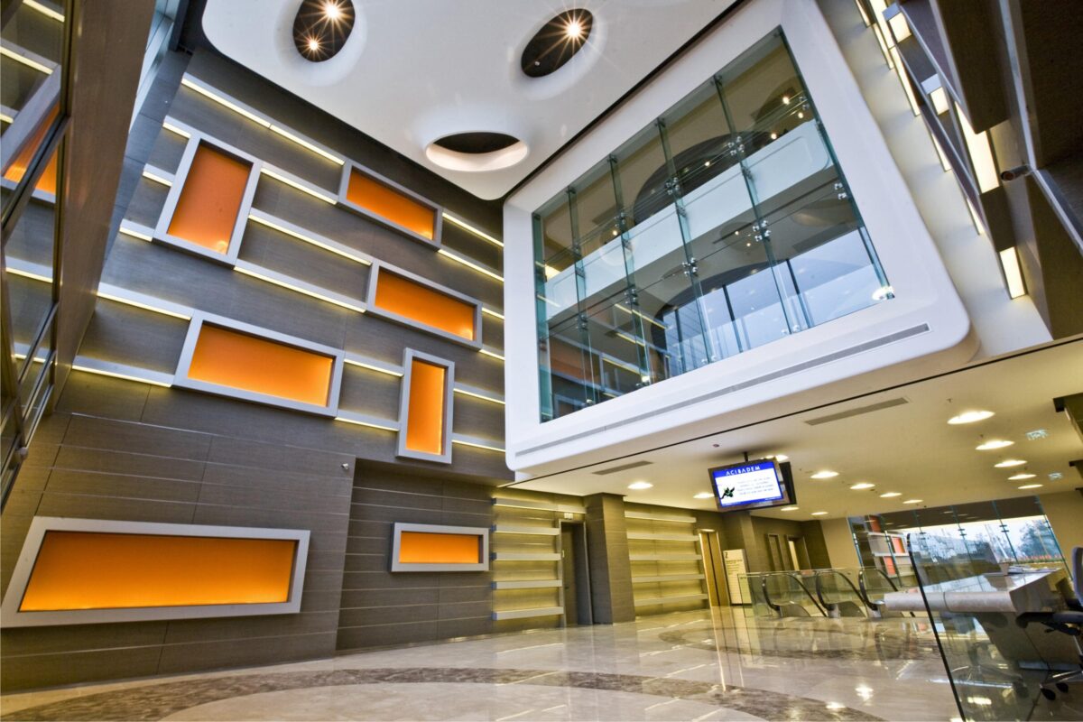 MoxieSurfaces - clear-PEP ECO satin orange backlit wall panels for healthcare interiors