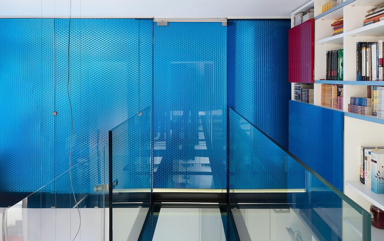 MoxieSurfaces - clear-PEP ECO color honeycomb panels in loft design