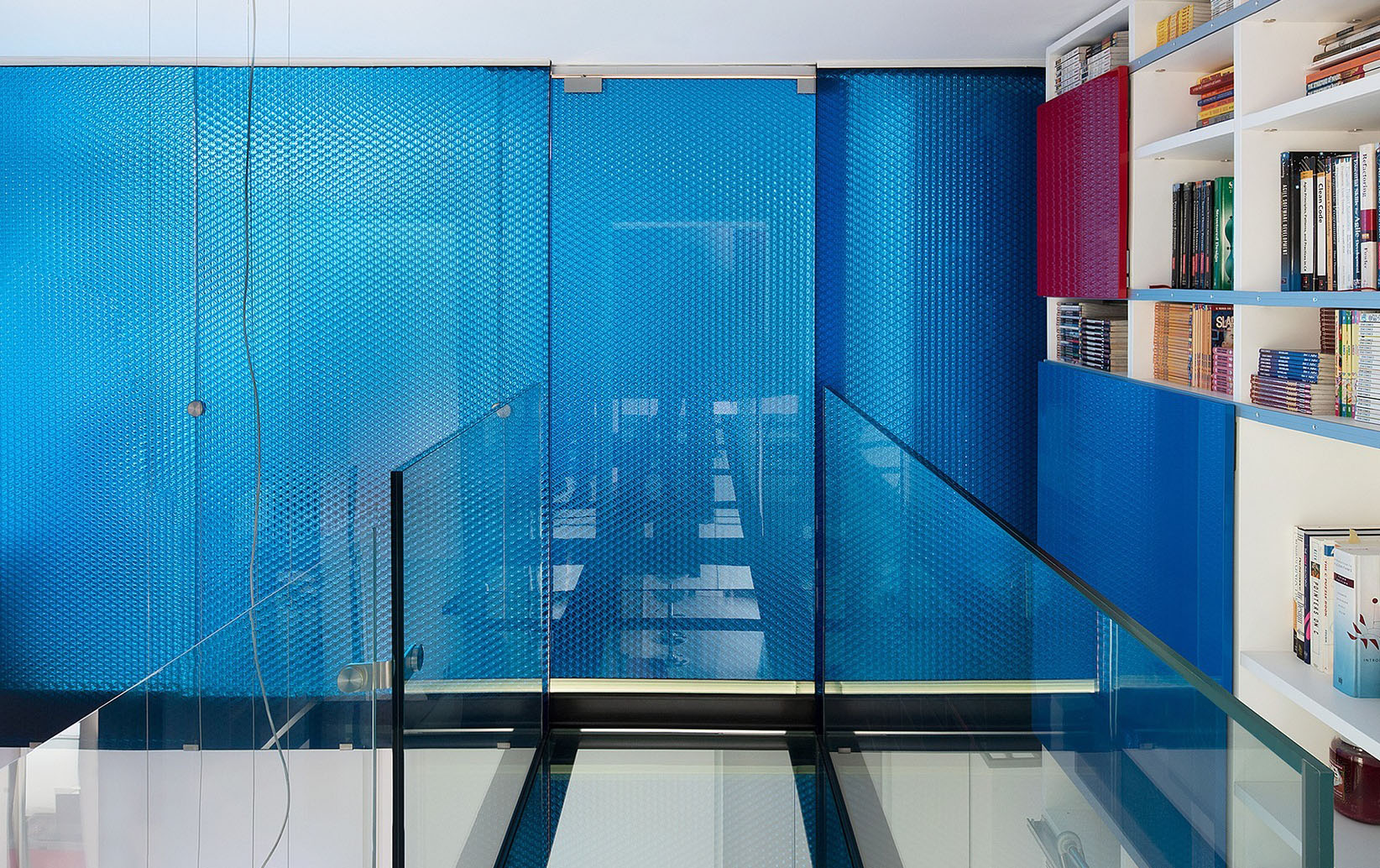 MoxieSurfaces - clear-PEP ECO color honeycomb panels in loft design