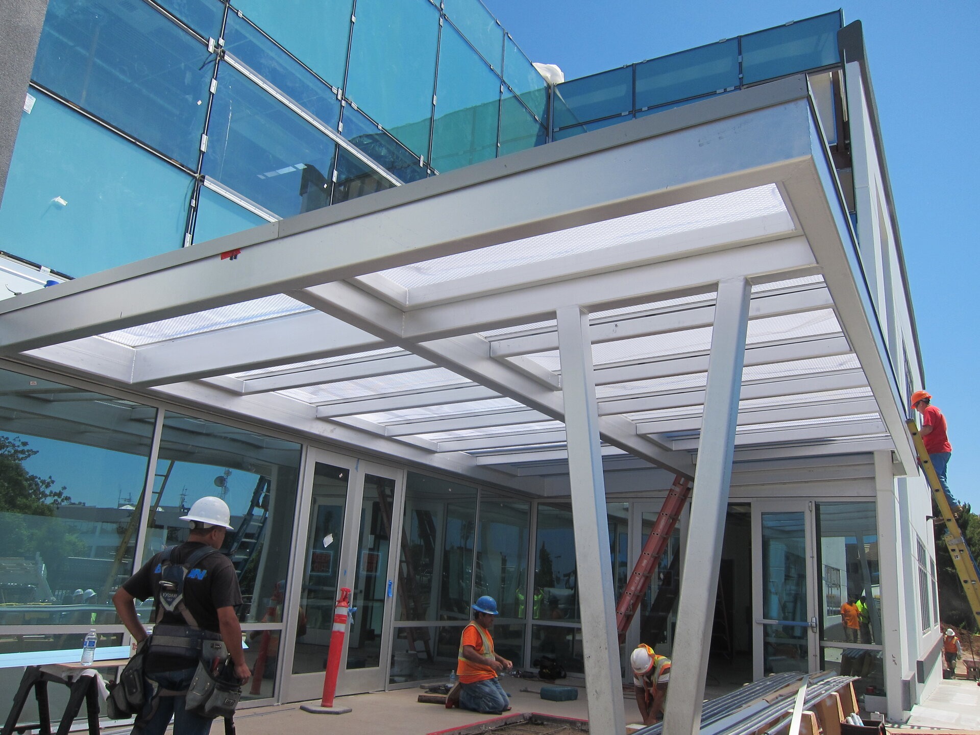 Moxie Surfaces - clear-PEP ECO as medical center entrance canopy