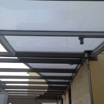 Translucent clear-PEP canopy and covered walkway for tall residential and office buildings Translucent clear-PEP canopy and covered walkway for tall residential and office buildings