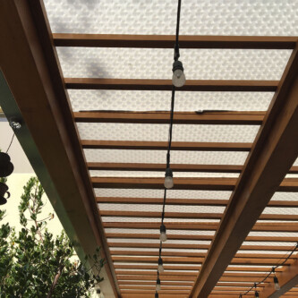 Patio built with clear-PEP satin translucent honeycomb panels - modern aesthetics with robust functionality Patio built with clear-PEP satin translucent honeycomb panels - modern aesthetics with robust functionality