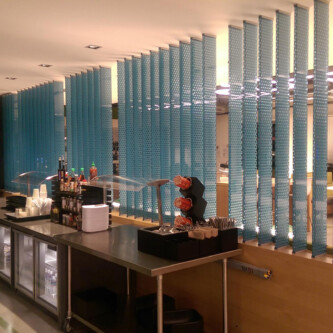 Vertical clear-PEP space dividers in lunch area Vertical clear-PEP space dividers in lunch area