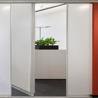 Flexible and stylish office spaces with AIR-board® acoustic MoxieSurfaces - AIR-board acoustic - walls dividers on rails