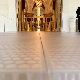 clear-PEP ECO PC stage panels protecting the world’s largest carpet at Sheikh Zayed Grand Mosque MoxieSurfaces - clear-PEP ECO PC stage at Sheikh Zayed Grand Mosque