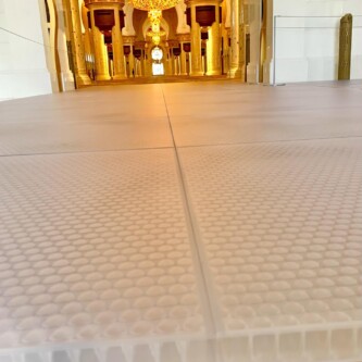 clear-PEP ECO PC stage panels protecting the world’s largest carpet at Sheikh Zayed Grand Mosque MoxieSurfaces - clear-PEP ECO PC stage at Sheikh Zayed Grand Mosque