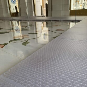 clear-PEP ECO PC stage panels protecting the world’s largest carpet at Sheikh Zayed Grand Mosque MoxieSurfaces - clear-PEP ECO PC stage at Sheikh Zayed Grand Mosque