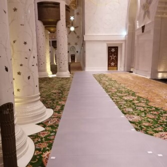 clear-PEP ECO PC stage panels protecting the world’s largest carpet at Sheikh Zayed Grand Mosque MoxieSurfaces - clear-PEP ECO PC stage at Sheikh Zayed Grand Mosque
