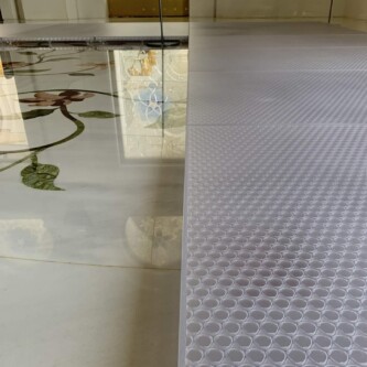clear-PEP ECO PC stage panels protecting the world’s largest carpet at Sheikh Zayed Grand Mosque MoxieSurfaces - clear-PEP ECO PC stage at Sheikh Zayed Grand Mosque