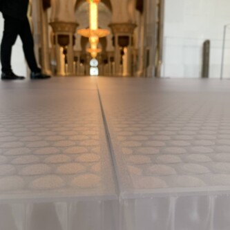 clear-PEP ECO PC stage panels protecting the world’s largest carpet at Sheikh Zayed Grand Mosque MoxieSurfaces - clear-PEP ECO PC stage at Sheikh Zayed Grand Mosque