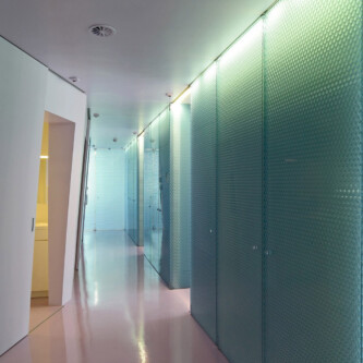 Enhanced design flexibility in dental clinic using clear-PEP ECO panels Moxie Surfaces - clear-PEP panels walls and doors