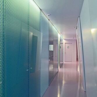 Enhanced design flexibility in dental clinic using clear-PEP ECO panels Moxie Surfaces - clear-PEP panels walls and doors