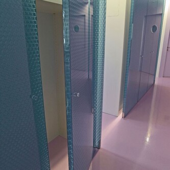 Enhanced design flexibility in dental clinic using clear-PEP ECO panels Moxie Surfaces - clear-PEP panels walls and doors