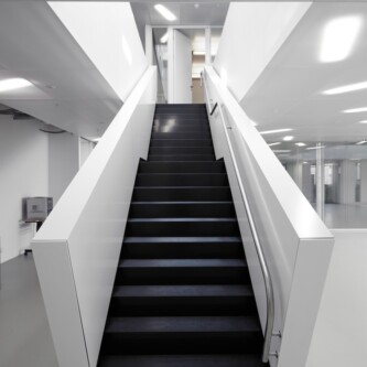 Translucent wall and ceiling acoustic panels quietly change how a space feels MoxieSurfaces - AIR-board translucent wall and ceiling acoustic panels in Logistics Complex